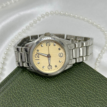 Silver Round Champagne Dial Watch