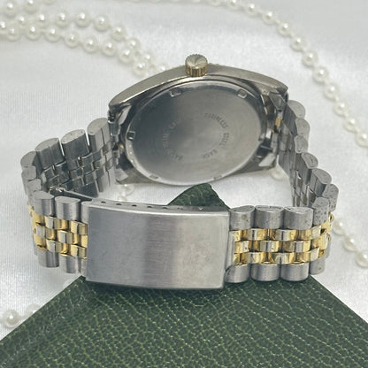 Two-Tone Geneva Tank Watch with Black Dial and Date Display