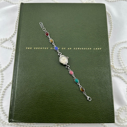 Vintage 10k gold filled Hamilton manual winding cocktail watch with multicolor scarab band.
