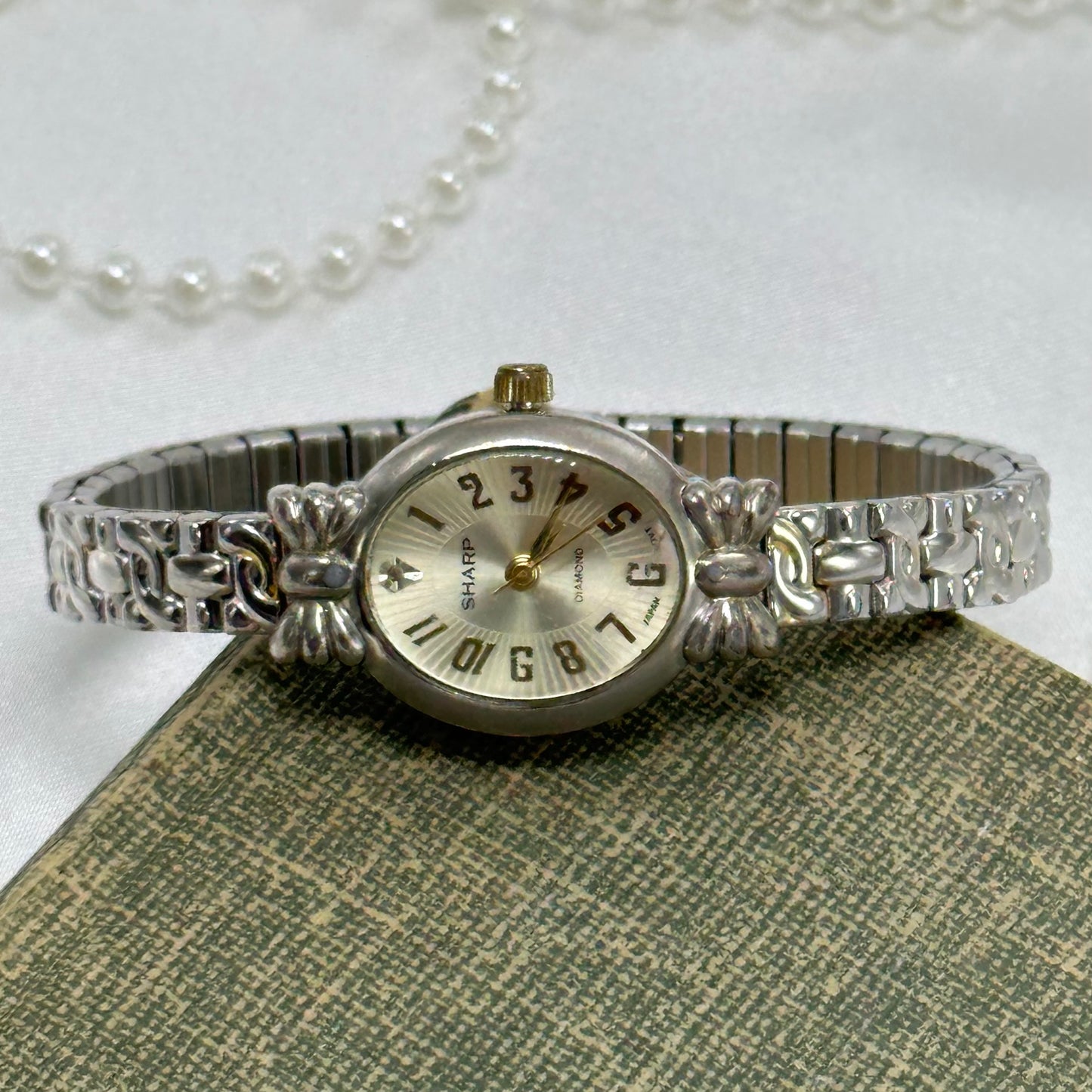 Two-Tone Oval Dial Watch with Bows