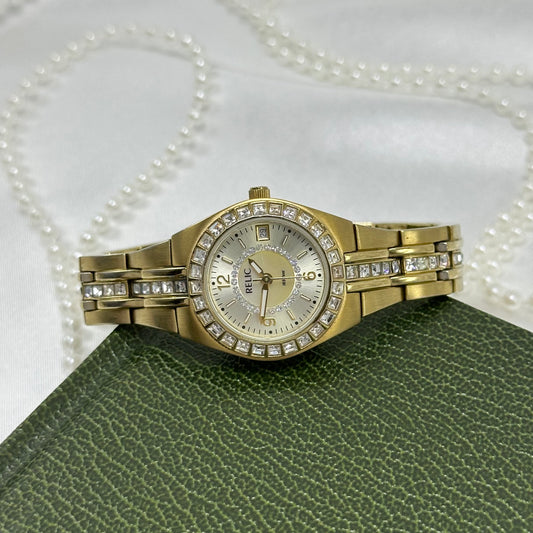 Queen's Court Gold Relic Watch with Crystal Accents and Date Display