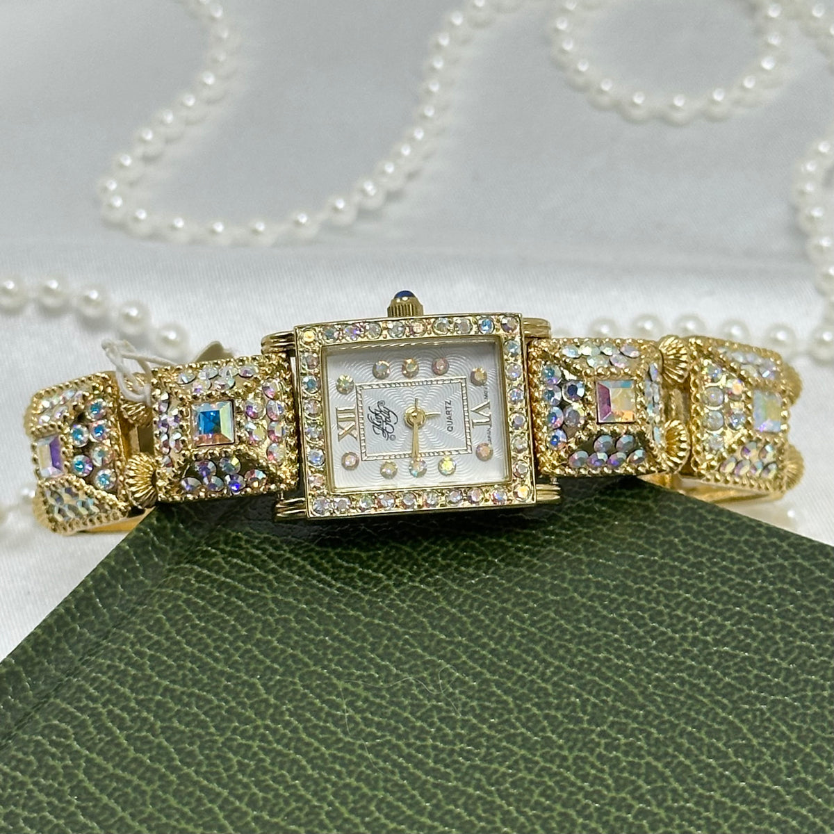 Rare Kirks Folly AB Watch with Blue Jewel Crown