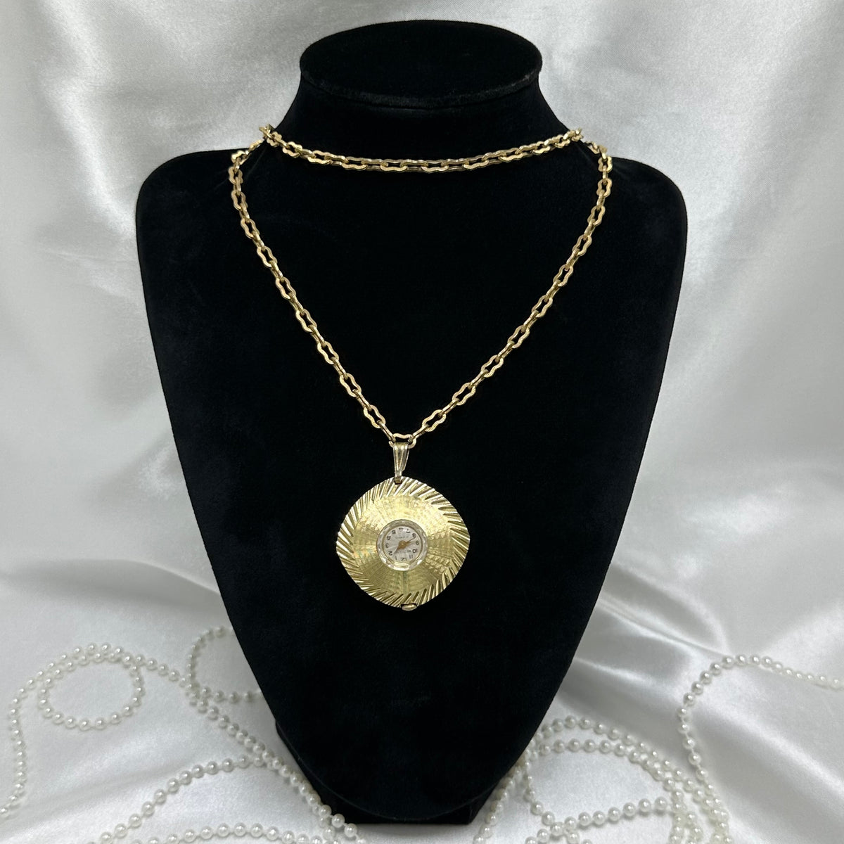 Vintage Westclox 17 jewels manual winding watch necklace with unique sunburst dial and original chain.