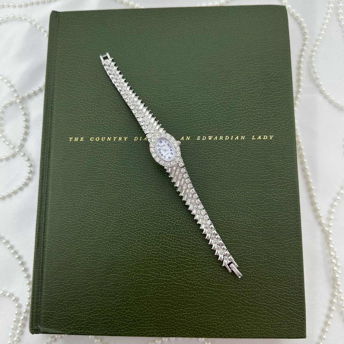 Elegant Crystal Silver Watch with Mother of Pearl Dial