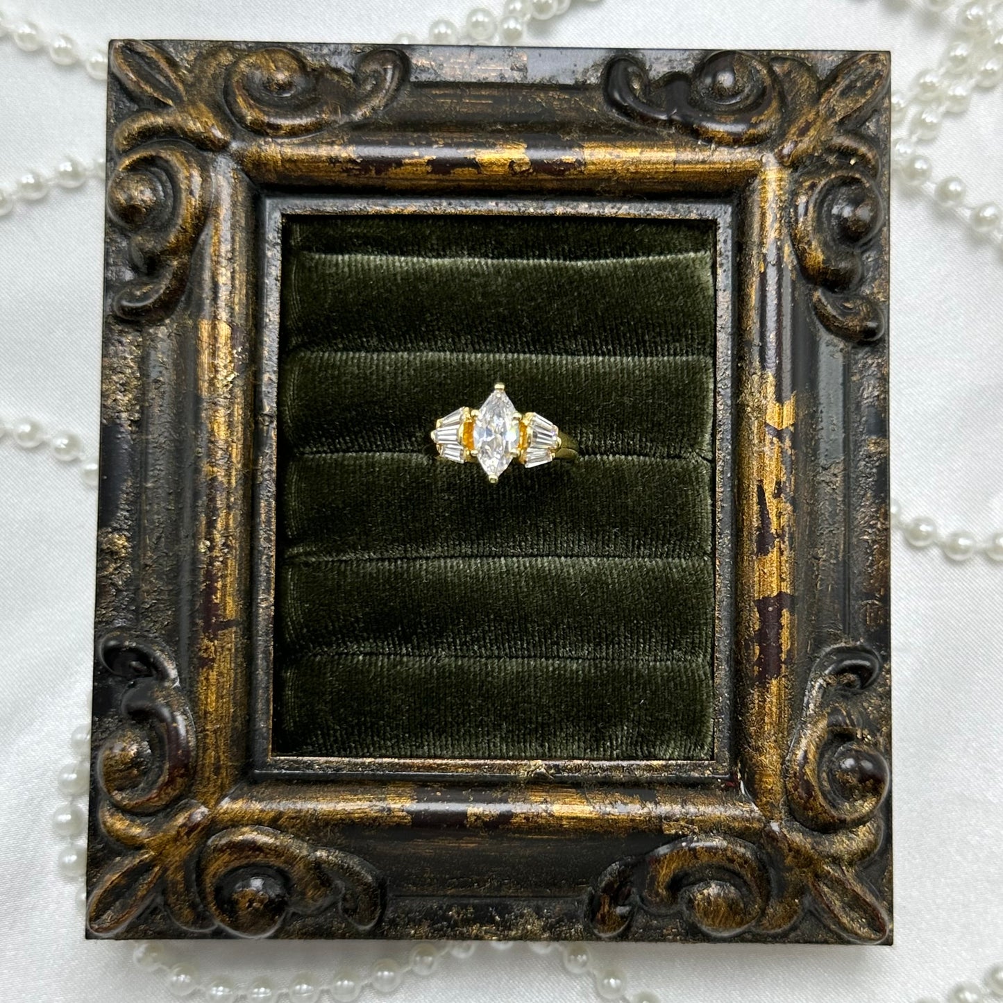 14k gold electroplated vintage deadstock cocktail ring with marquise clear stone and cubic zirconia stones.