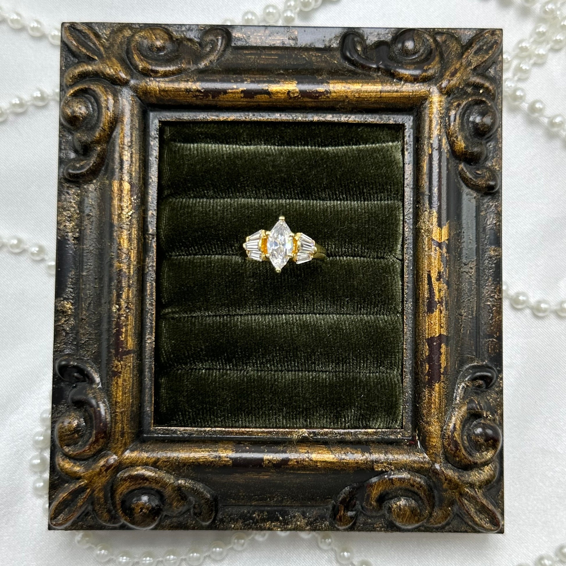 14k gold electroplated vintage deadstock cocktail ring with marquise clear stone and cubic zirconia stones.