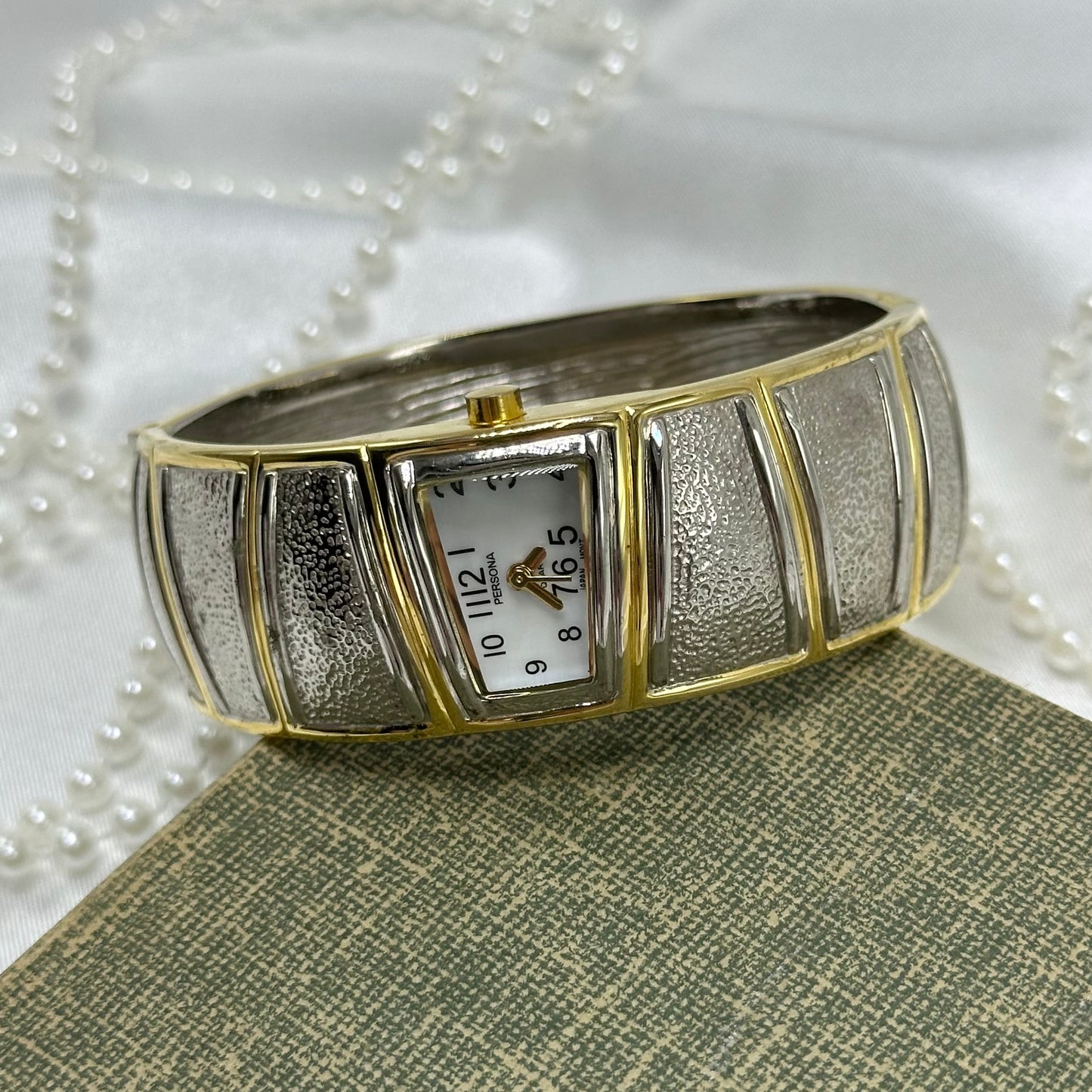 Sleek Two-Tone Cuff Watch