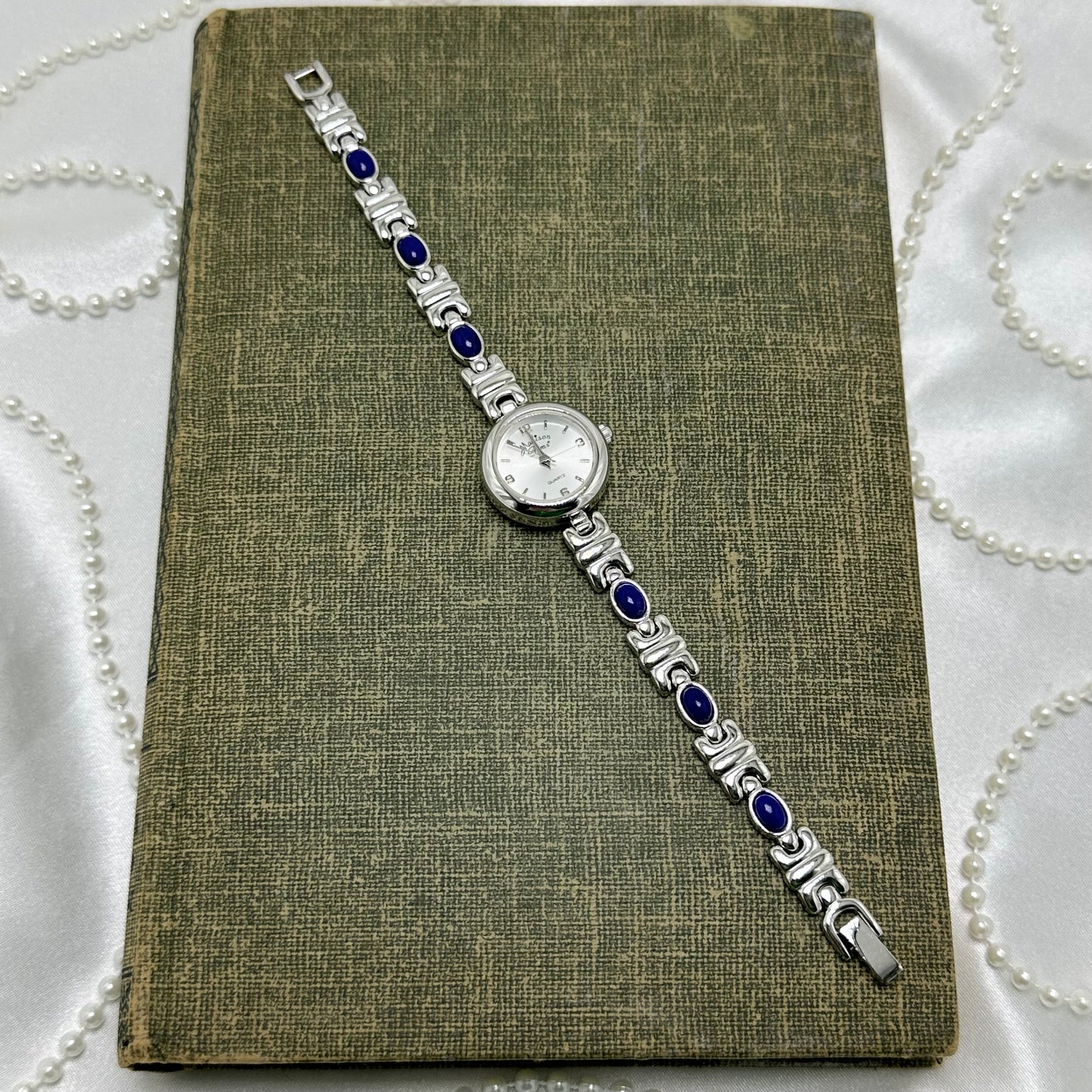 Silver Round Dial Watch with Blue Gemstone Band