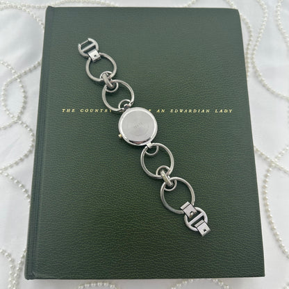 Round Dial Silver Minicci Watch with Gold Hands and Circle Links
