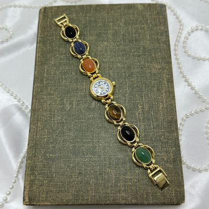 Vintage Gold Scarab Watch with Mother of Pearl Dial