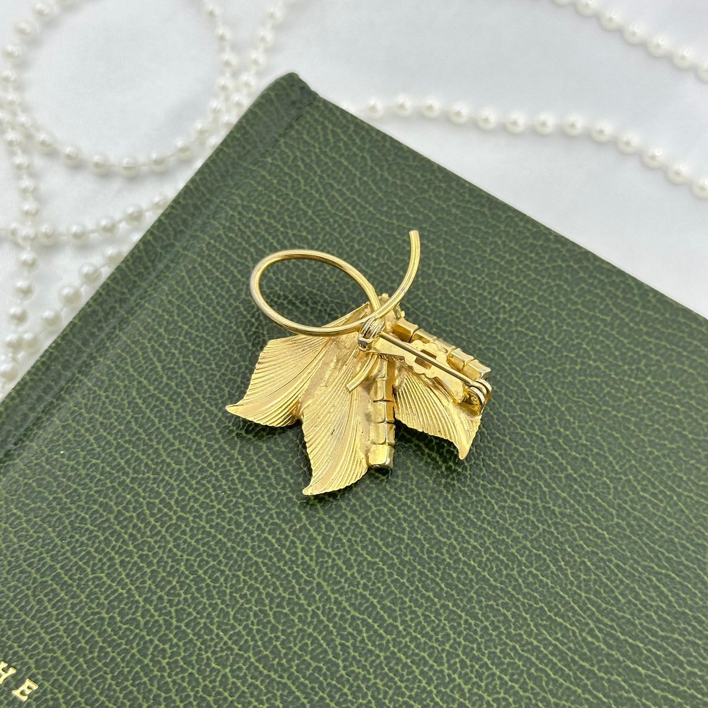 Gold Leaf Brooch with Red Stones