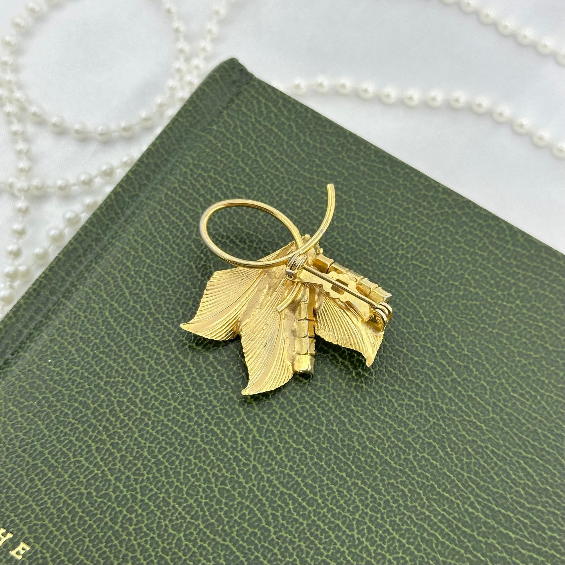 Gold Leaf Brooch with Red Stones