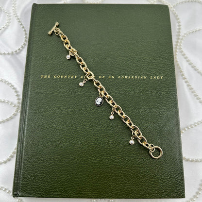 Gold Pearls and Black Cameo Charm Bracelet