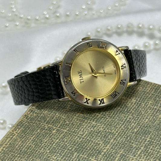 Gold Round Dial Watch with Roman Numeral Markers