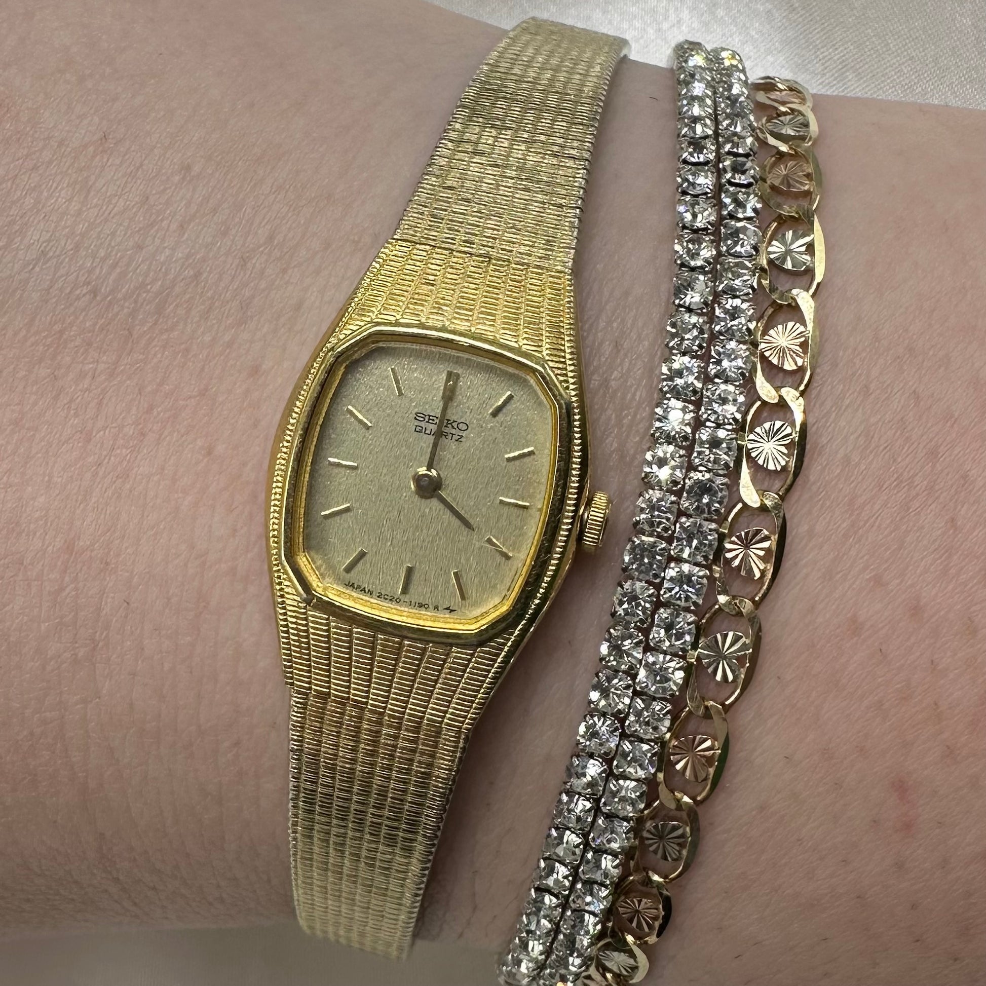 Gold Tone Seiko square dial watch with Quartz Movement.