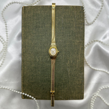 Gold Watch with Bows
