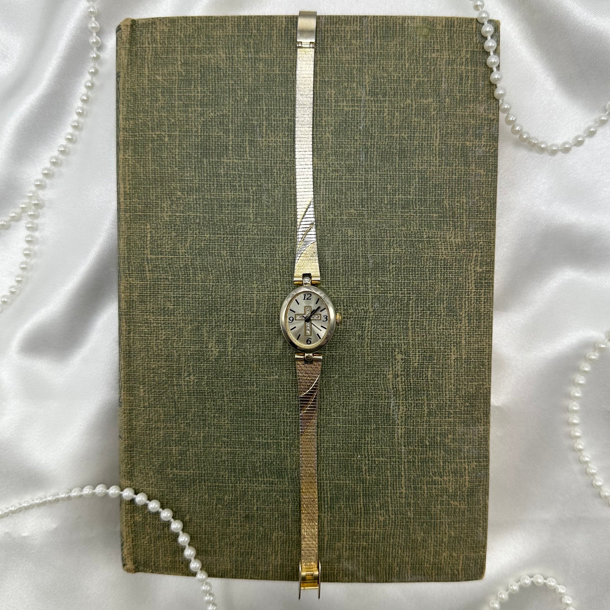 Gold and silver tone diamanté cross watch