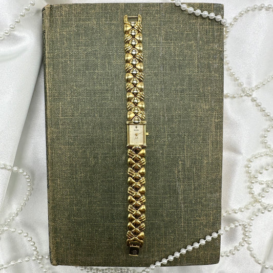 Gold tone Elgin square dial watch with quartz movement and clasp band