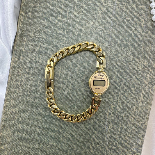 Gold tone Lady Sovereign digital watch with quartz movement