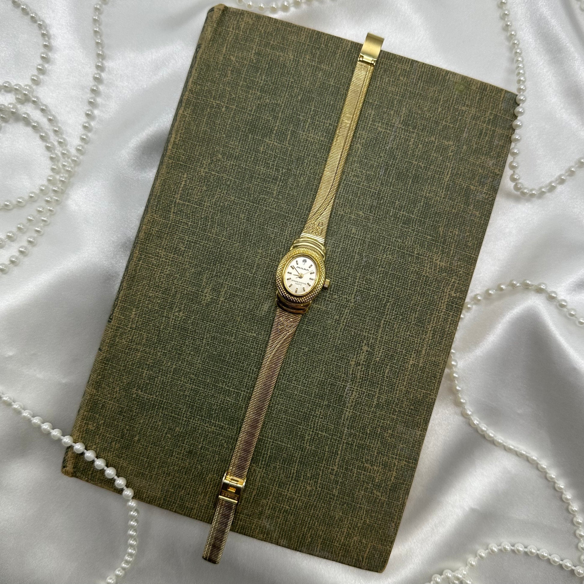Gold tone Milan watch with cute bows