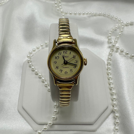 Gold tone Timex watch with quartz movement