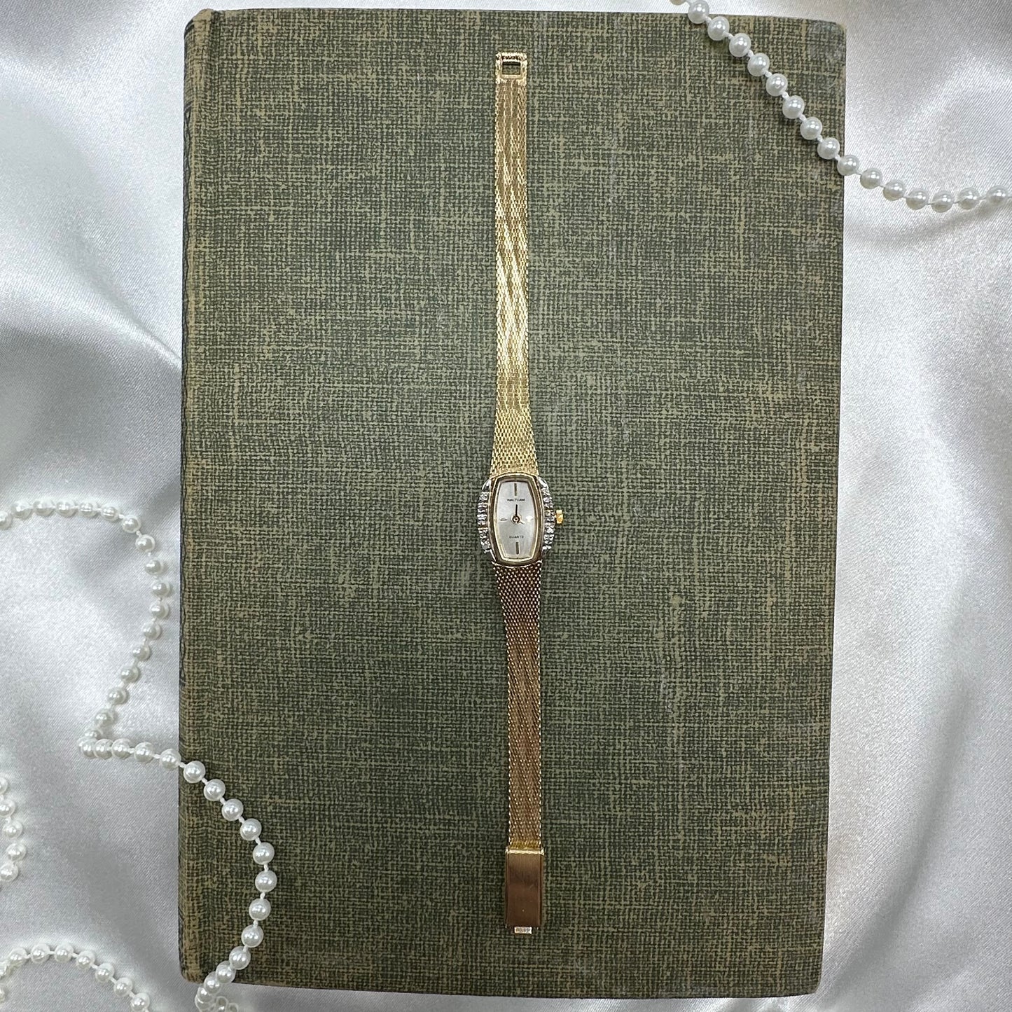 Gold tone diamanté Waltham watch with quartz movement.