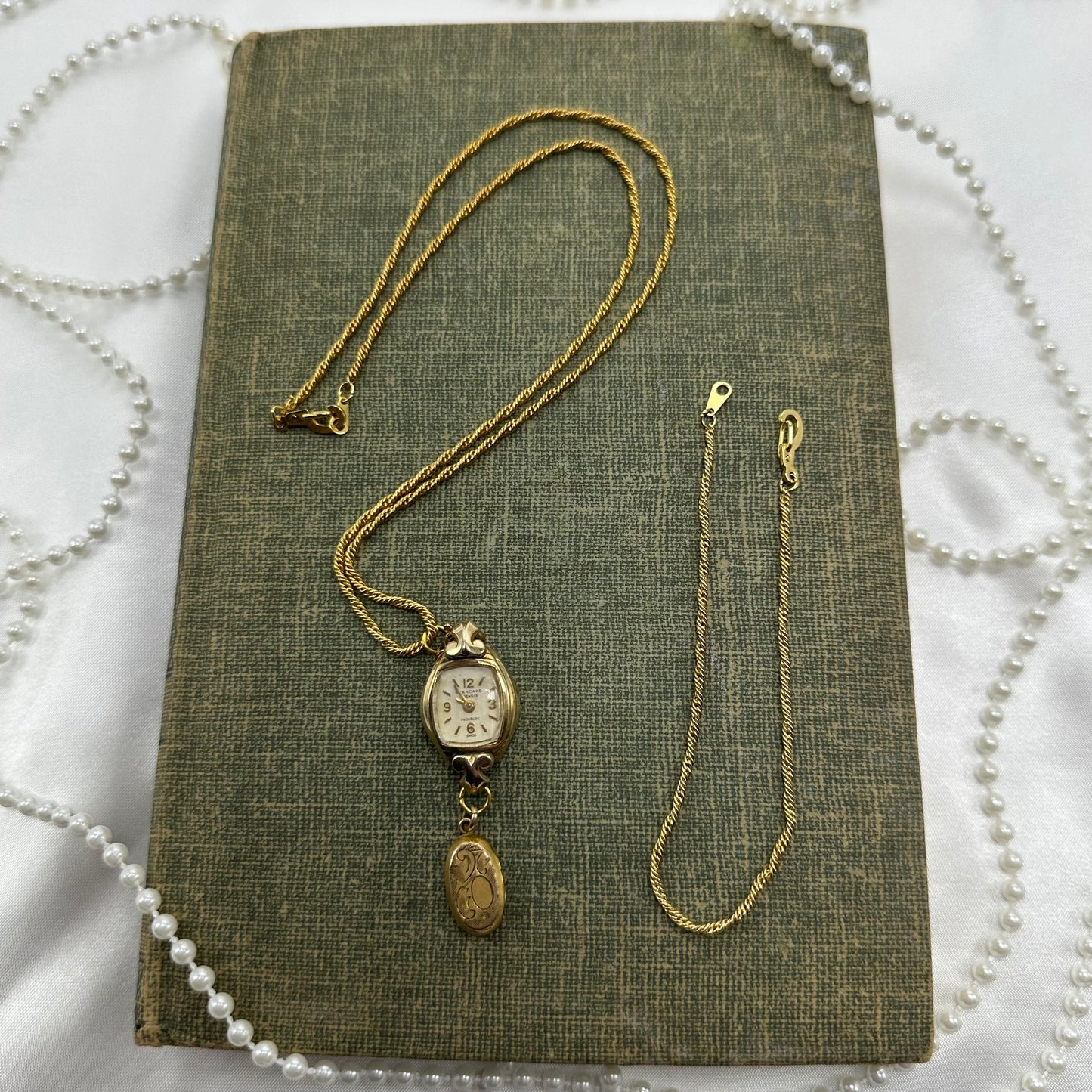 Gold tone necklace with vintage 10k RGP watch and oval locket pendant