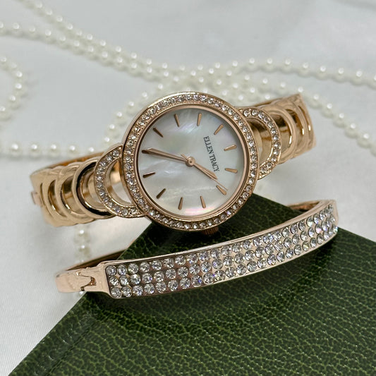 Rose gold tone Ellen Tracy cuff watch set with mother of pearl diamanté dial and hinged open band. Comes with matching bracelet.