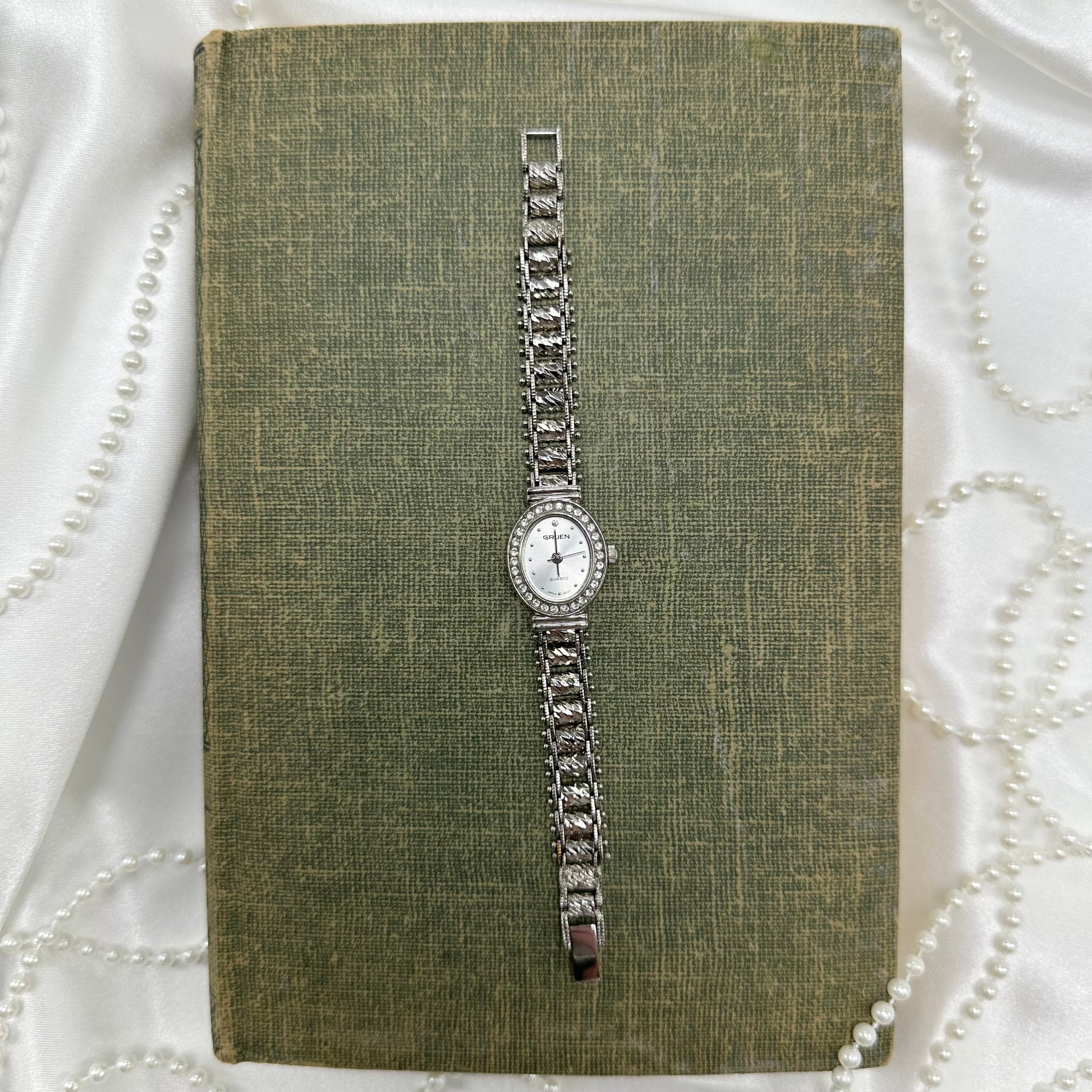 Silver diamanté Gruen oval dial watch with quartz movement