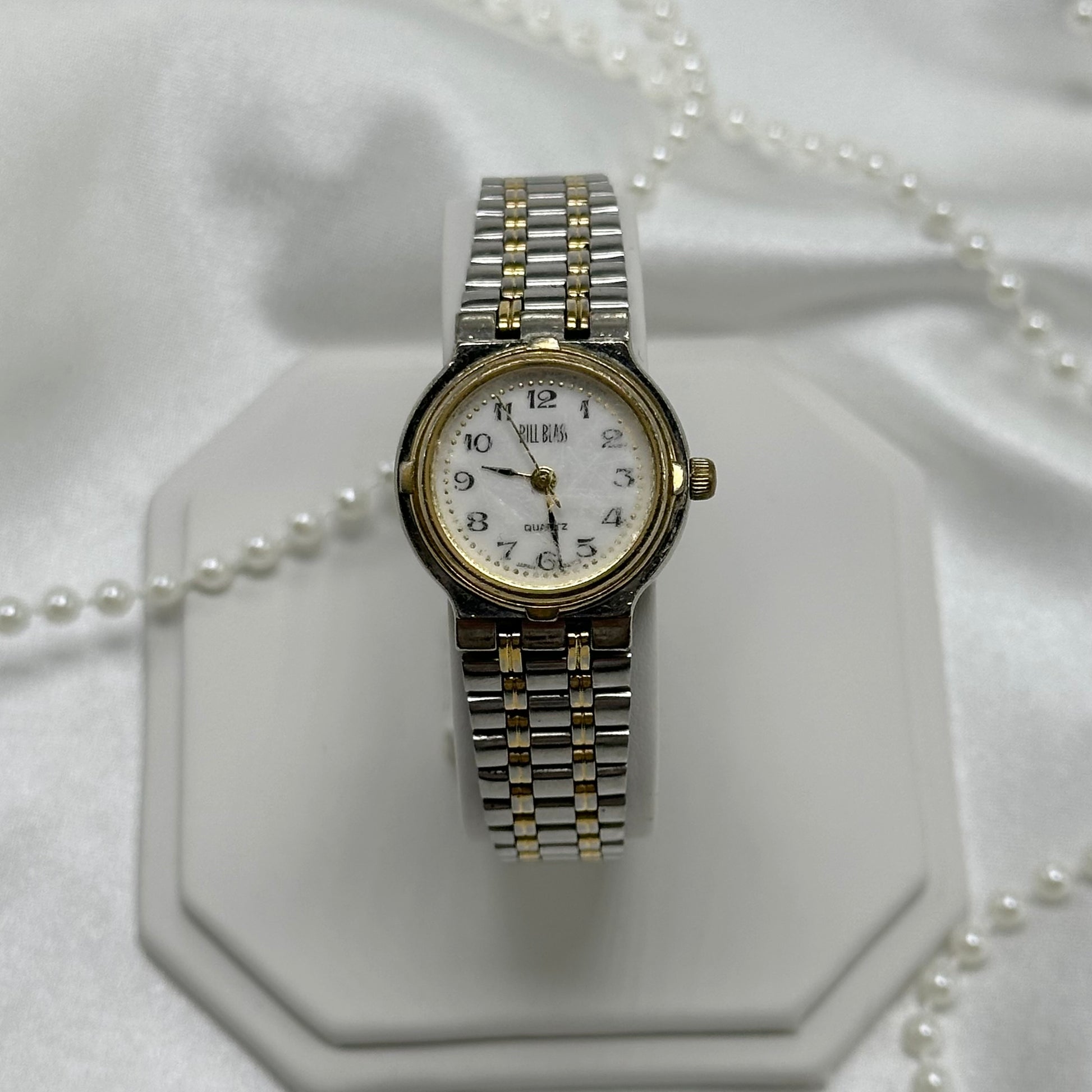 Silver & gold tone Bill Blass watch with quartz movement