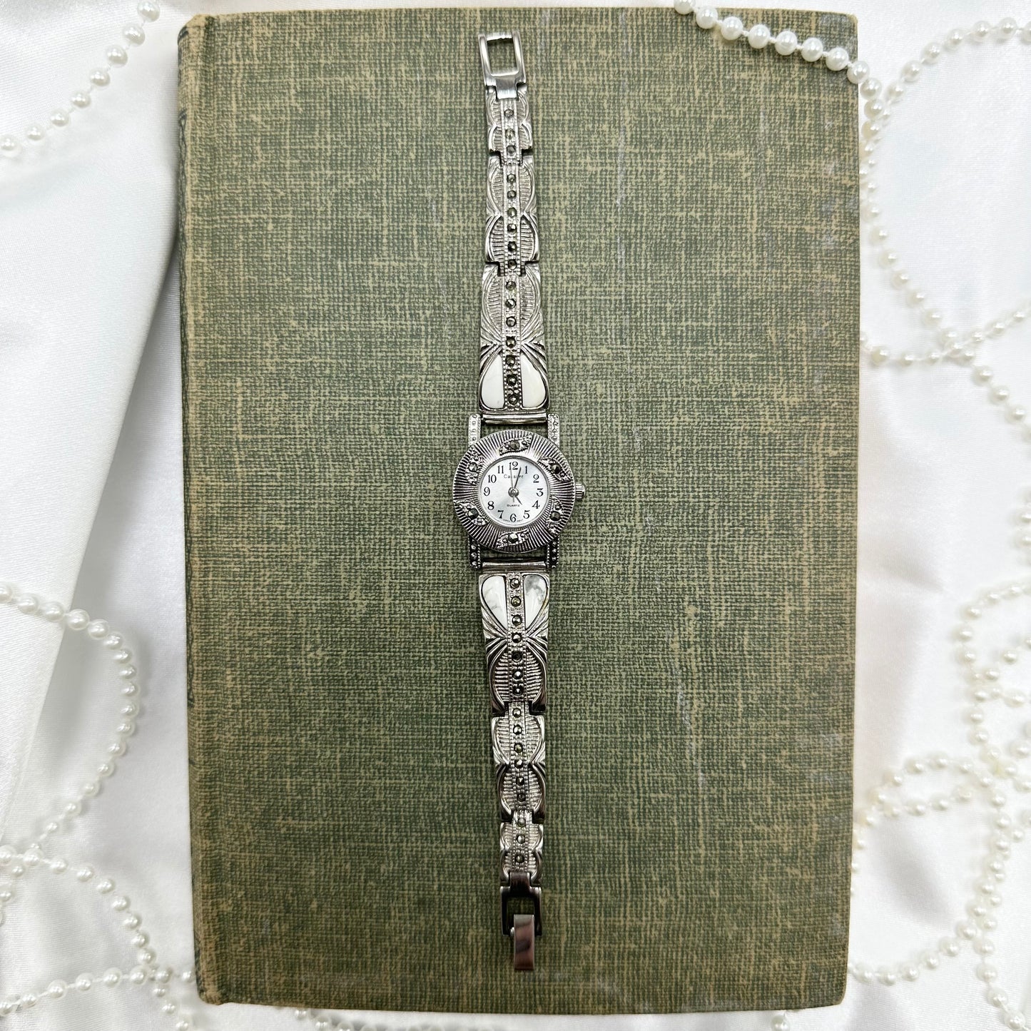 Silver tone Cassant Marcasite watch with quartz movement