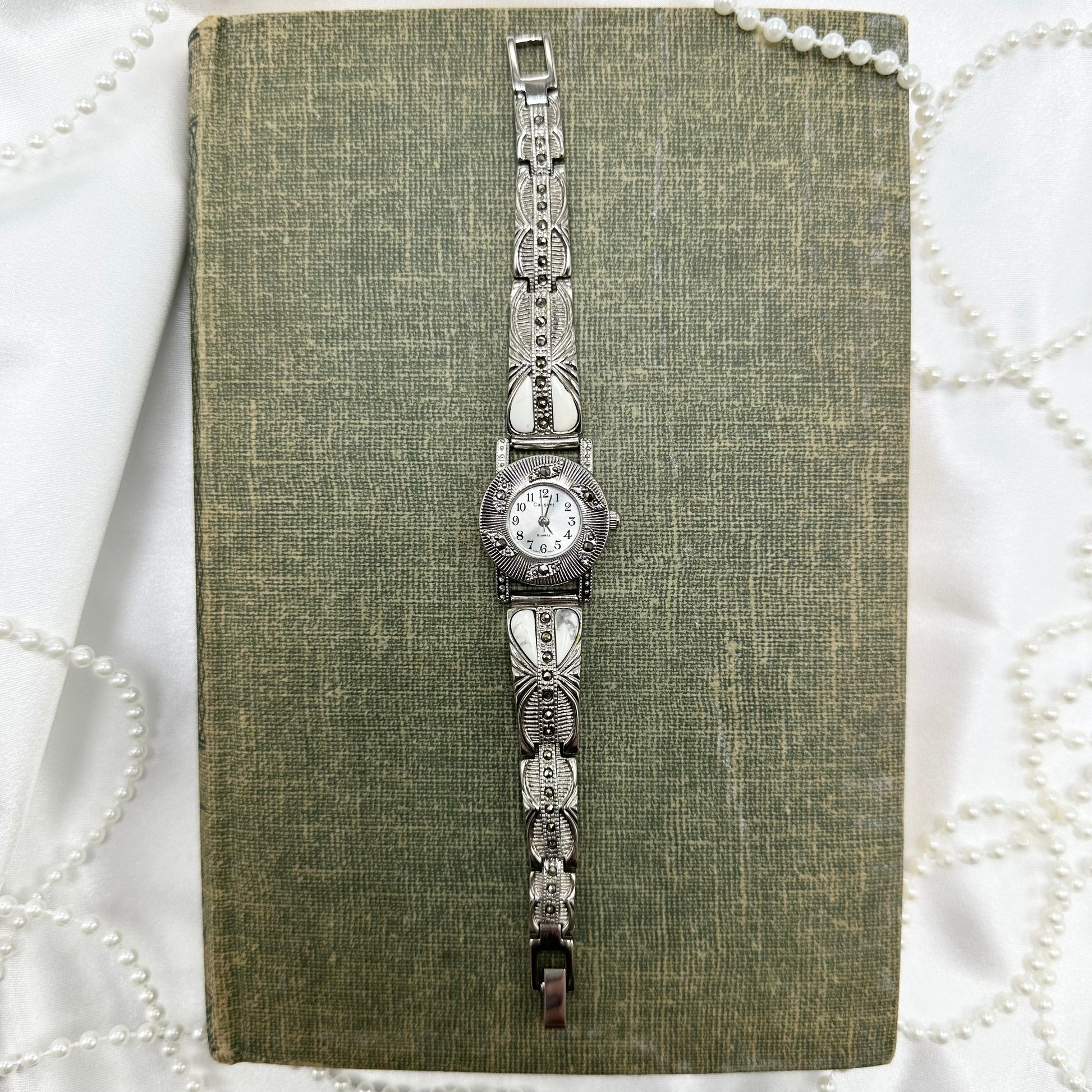 Silver tone Cassant Marcasite watch with quartz movement