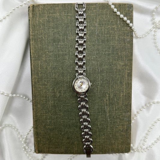 Silver tone Fabergé round dial watch with quartz movement