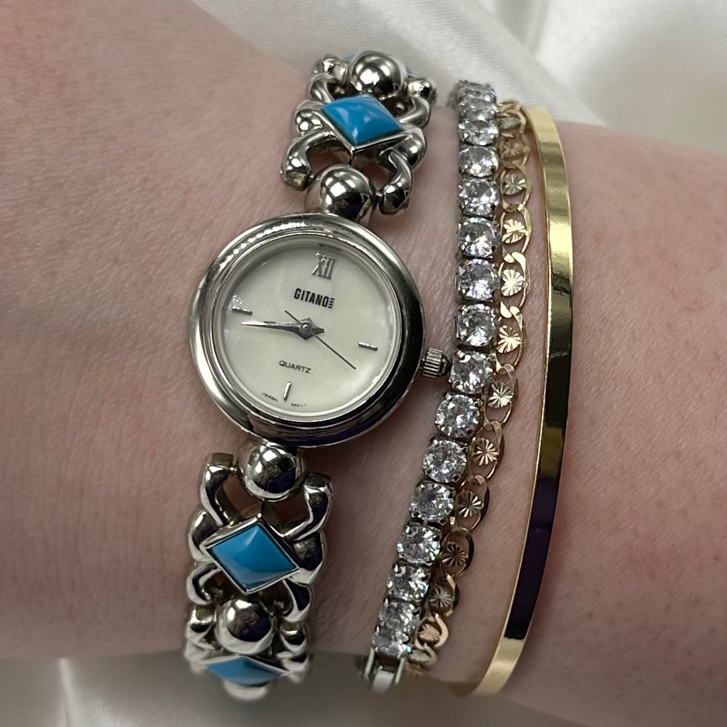 Silver tone and turquoise Gitano watch with quartz movement