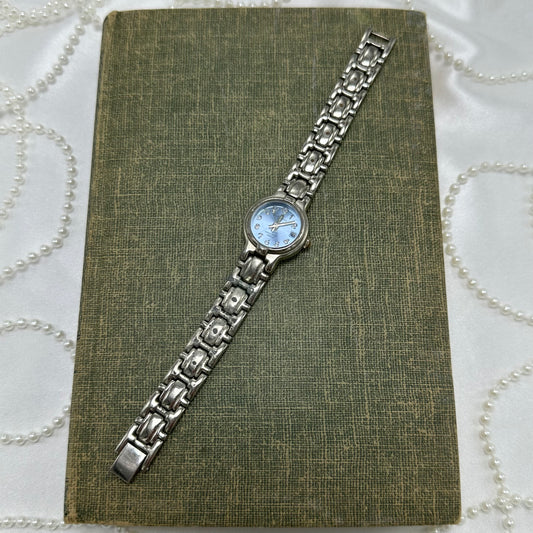 Silver tone light blue dial LA Express watch with date display and clasp band