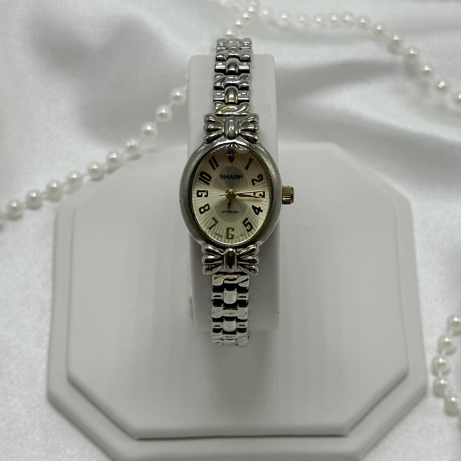 Two-Tone Oval Dial Watch with Bows