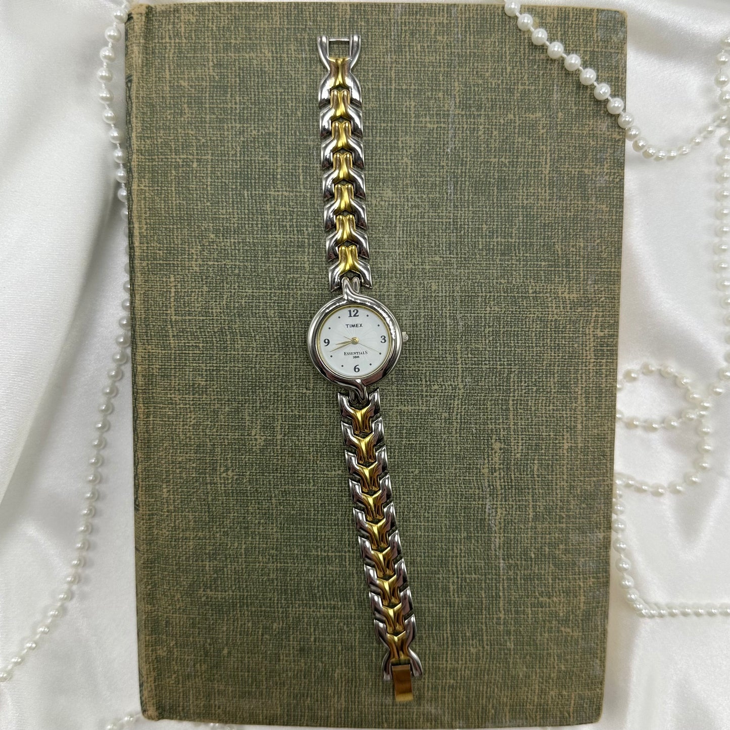 Two-tone Timex Essentials round dial watch with quartz movement