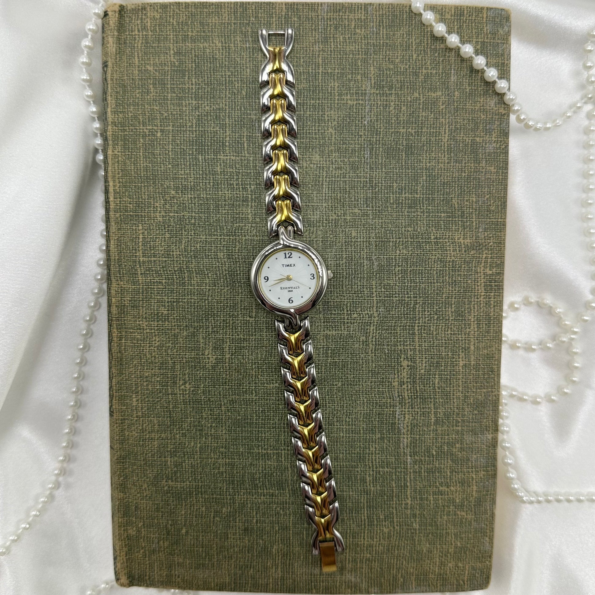 Two-tone Timex Essentials round dial watch with quartz movement