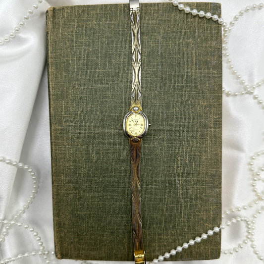 Two-tone Wrangler oval dial watch with quartz movement