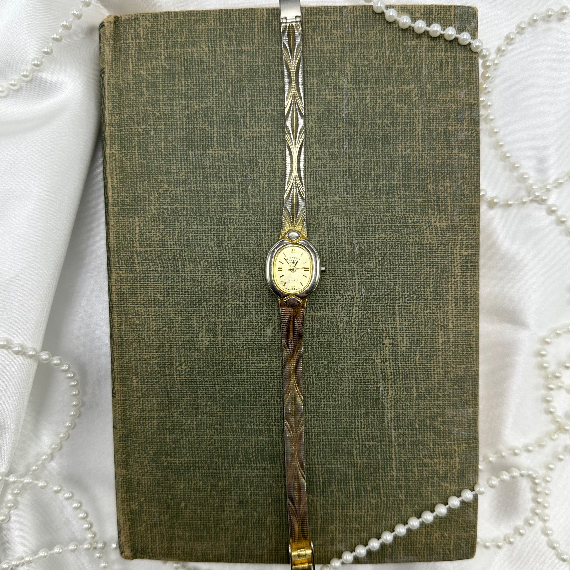 Two-tone Wrangler oval dial watch with quartz movement