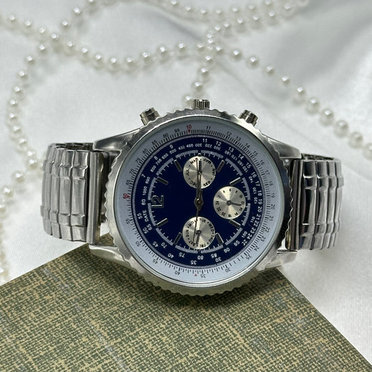 Unique Haband silver tone chronograph watch with navy blue dial and stretchable band.