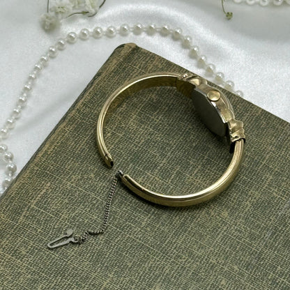 Vintage 10k gold filled Benrus Swiss manual winding cuff watch