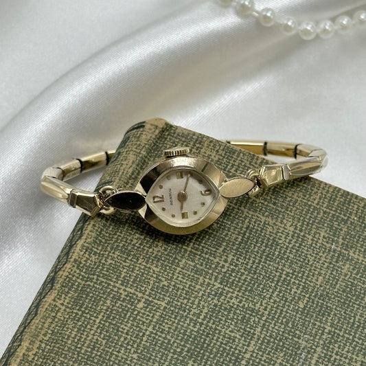 Vintage Benrus 20 micron gold manual winding watch with stretchable band