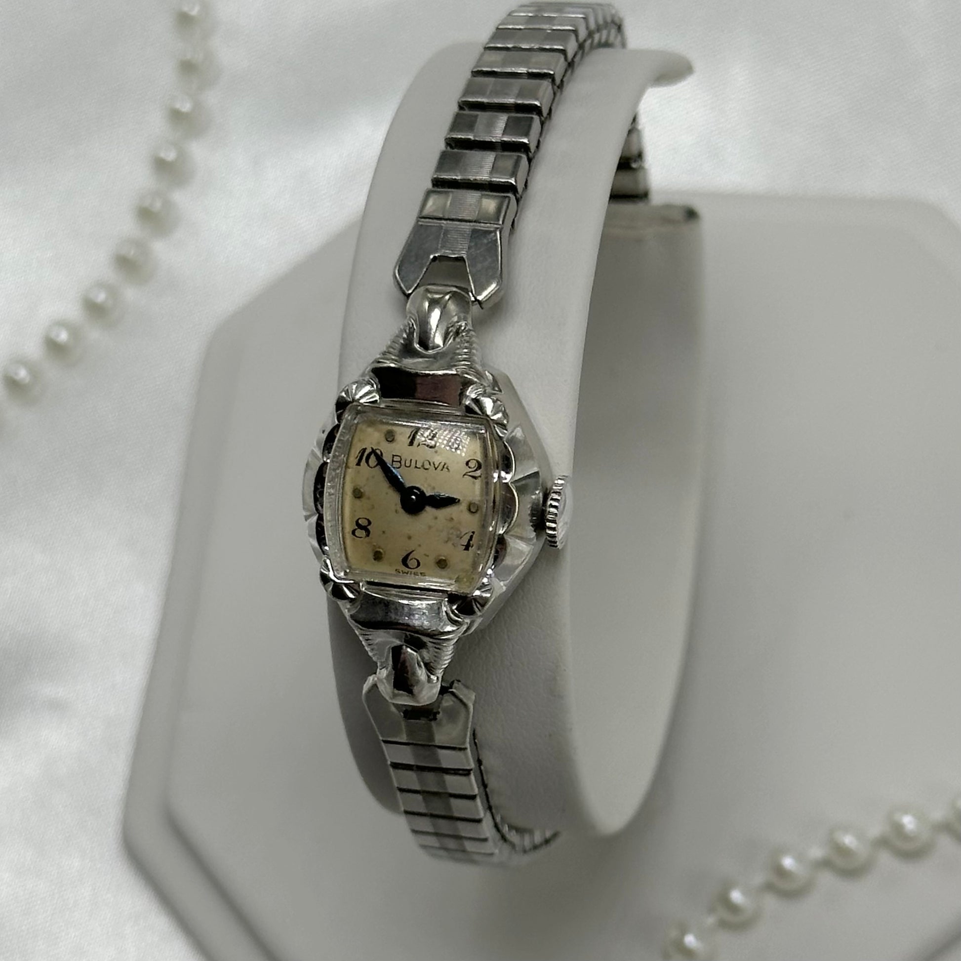 Vintage Bulova 10k rolled gold-plated manual winding watch with blue hands