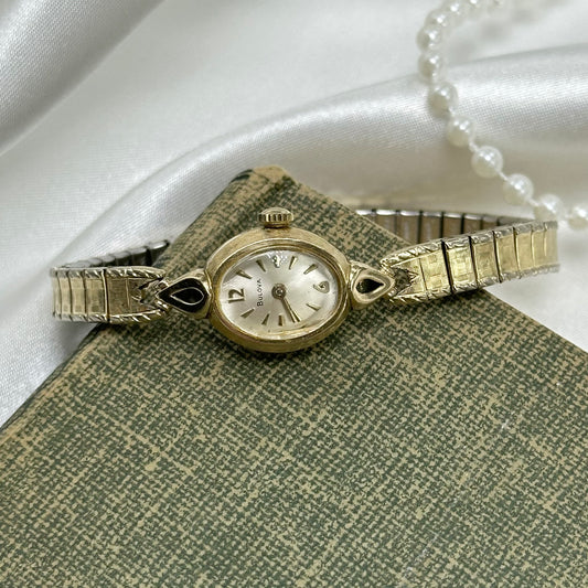 Vintage Bulova 10k rolled gold-plated manual winding watch with stretchable band from 1970