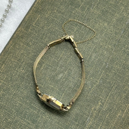 Vintage Caravelle manual winding watch with clasp band from the 1960