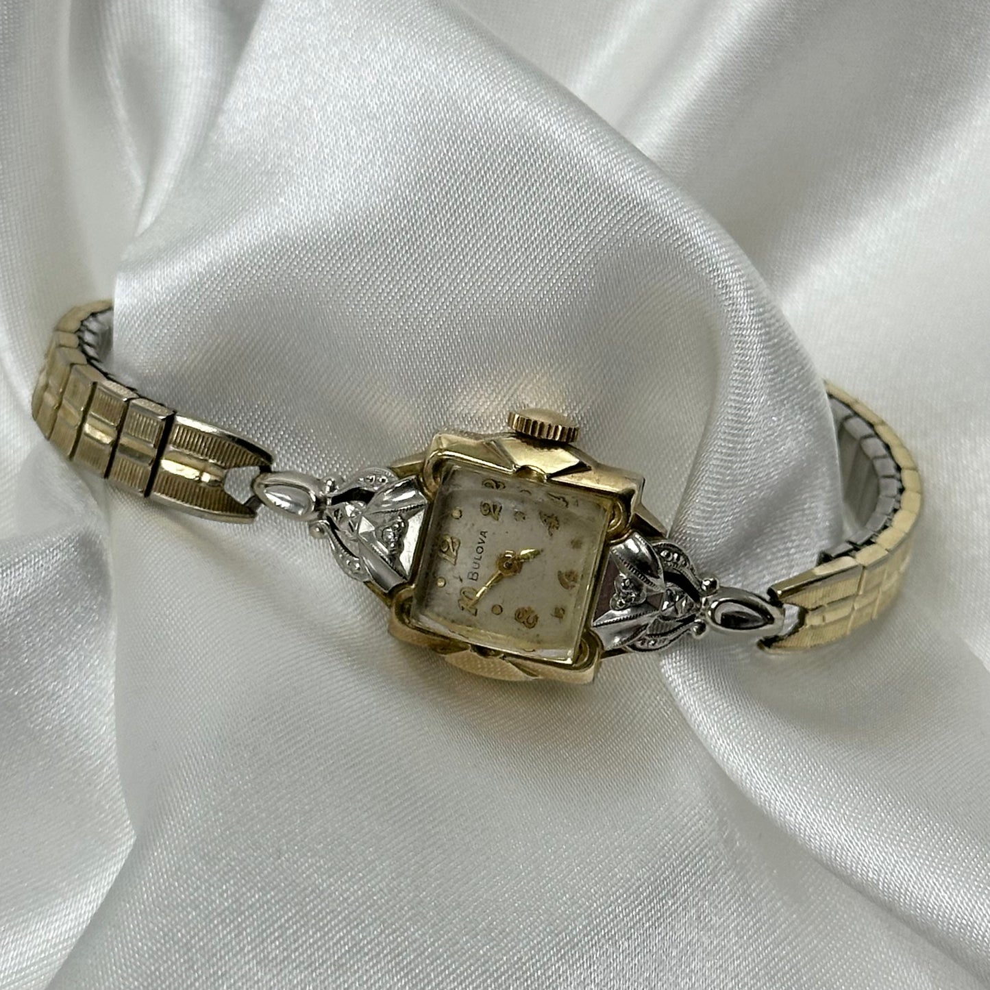 Vintage Diamanté Bulova 10k rolled gold-plated manual winding watch with stretchable band from 1957
