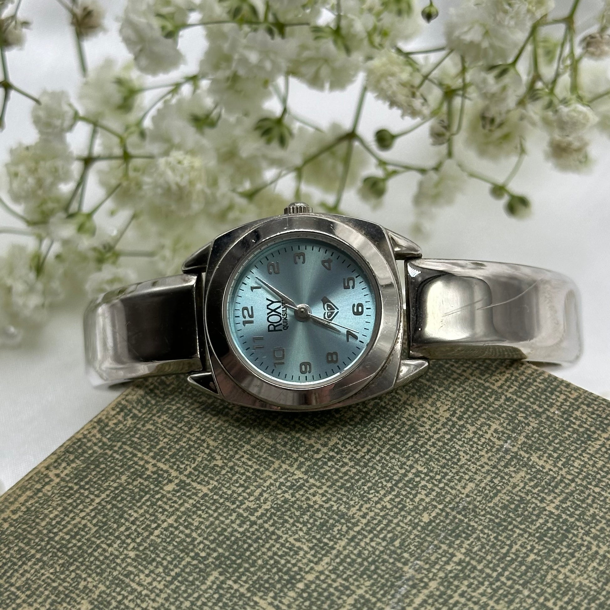 Vintage ROXY Quiksilver cuff watch with blue dial