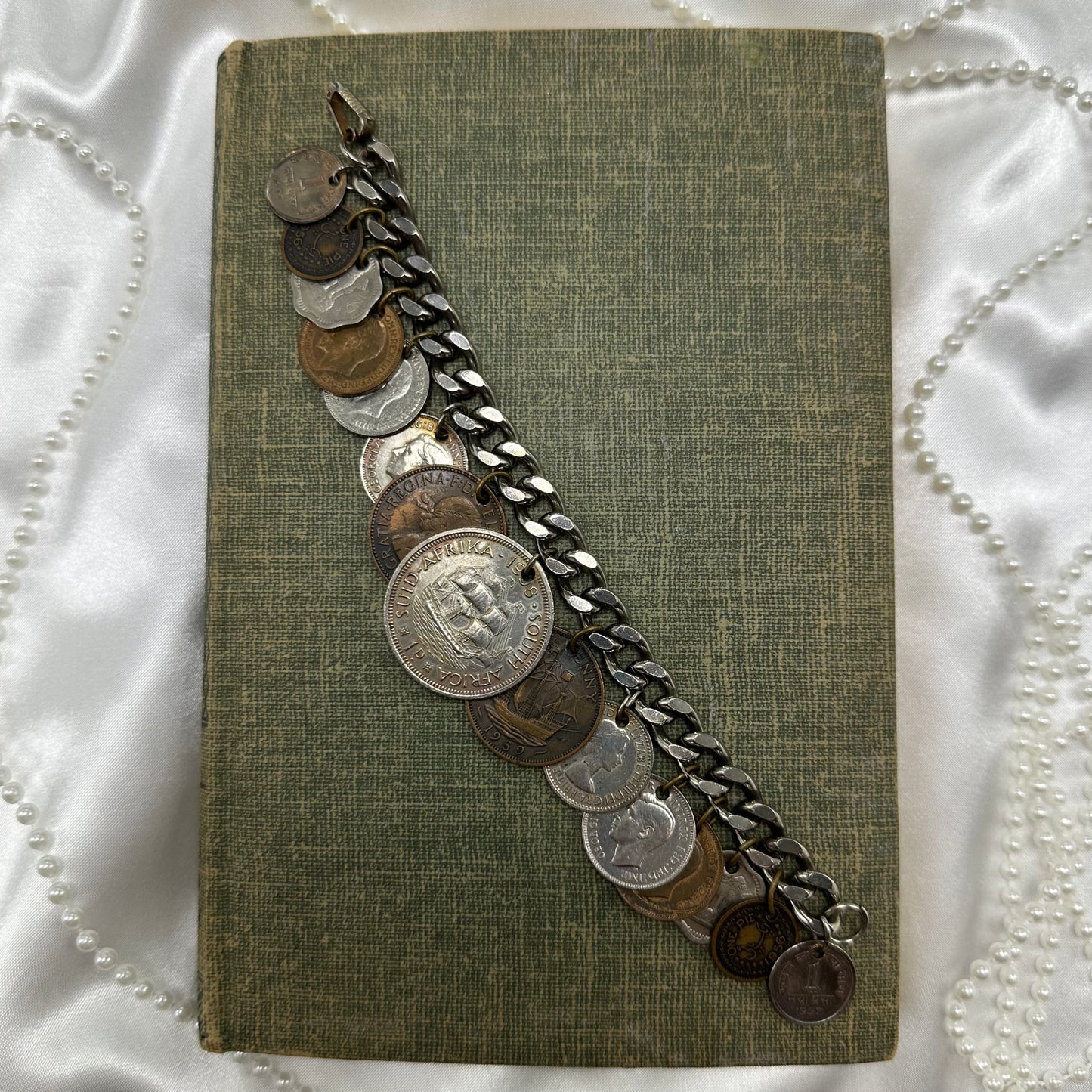 Vintage charm style coin bracelet. Coins are from various countries
