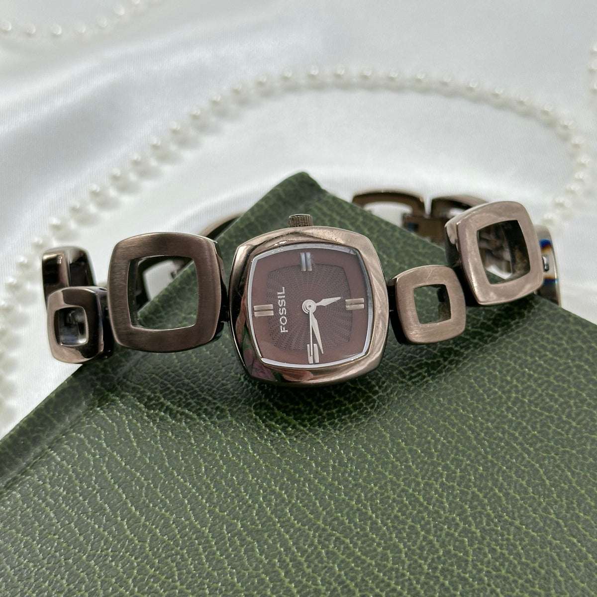 Vintage chocolate brown color Fossil watch with abstract funky squares clasp band and textured square dial.